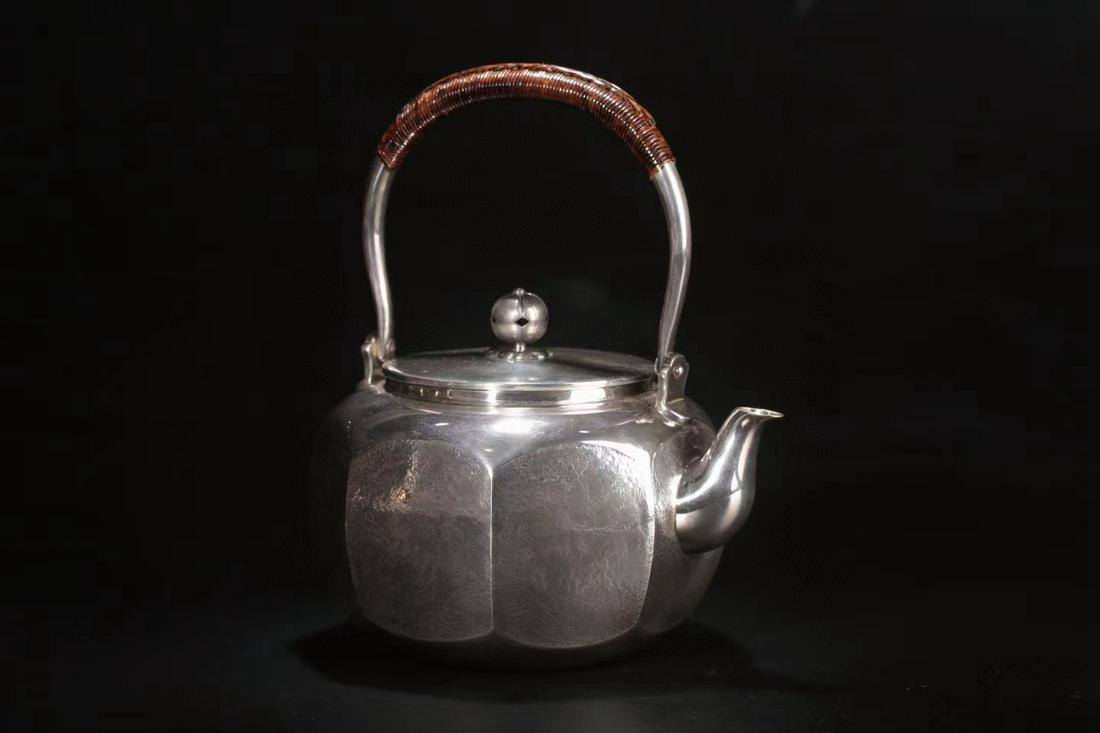 A TIN TEAPOT WITH HANDLE,QING DYNASTY (1 of 8)