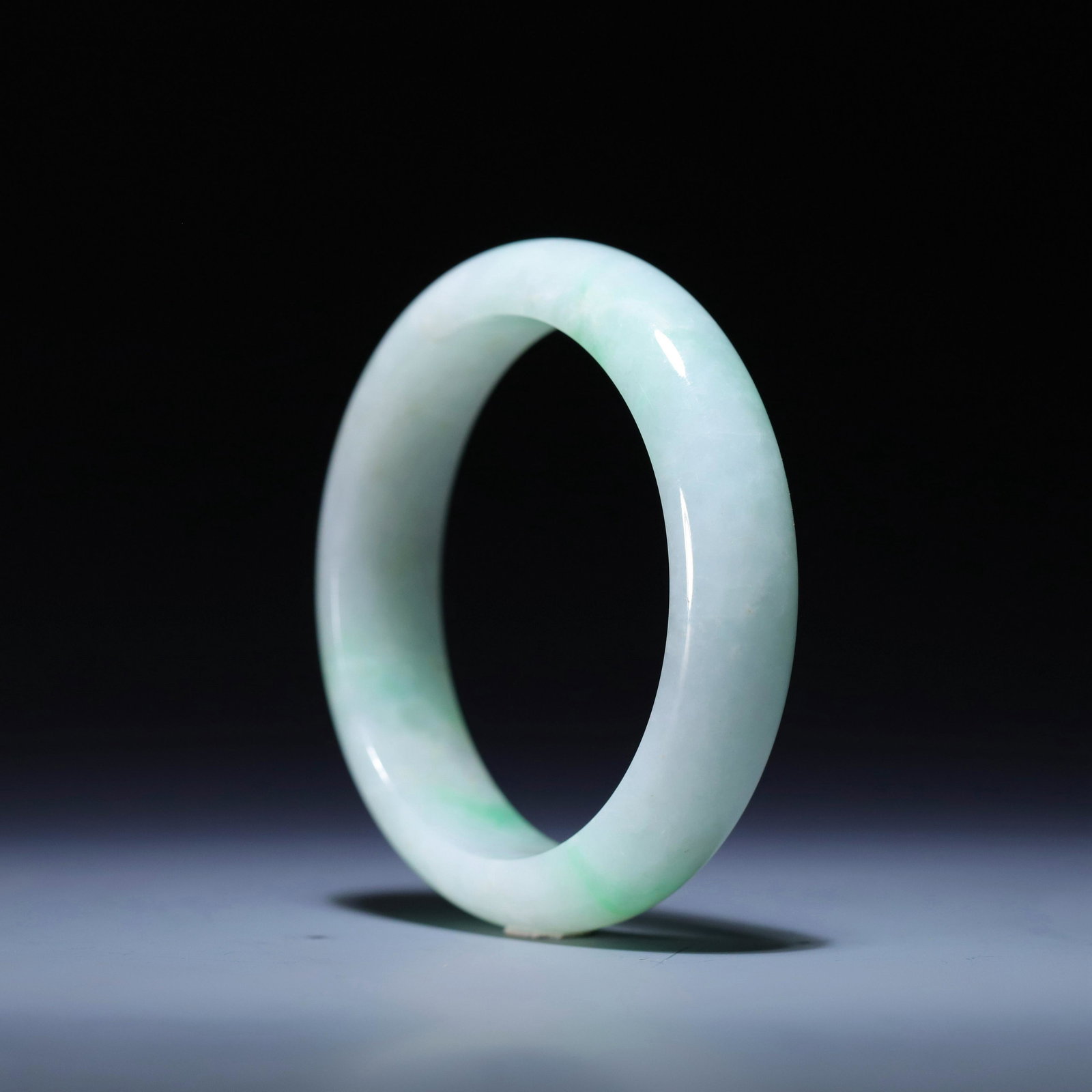A JADEITE BANGLE,QING DYNASTY (1 of 4)