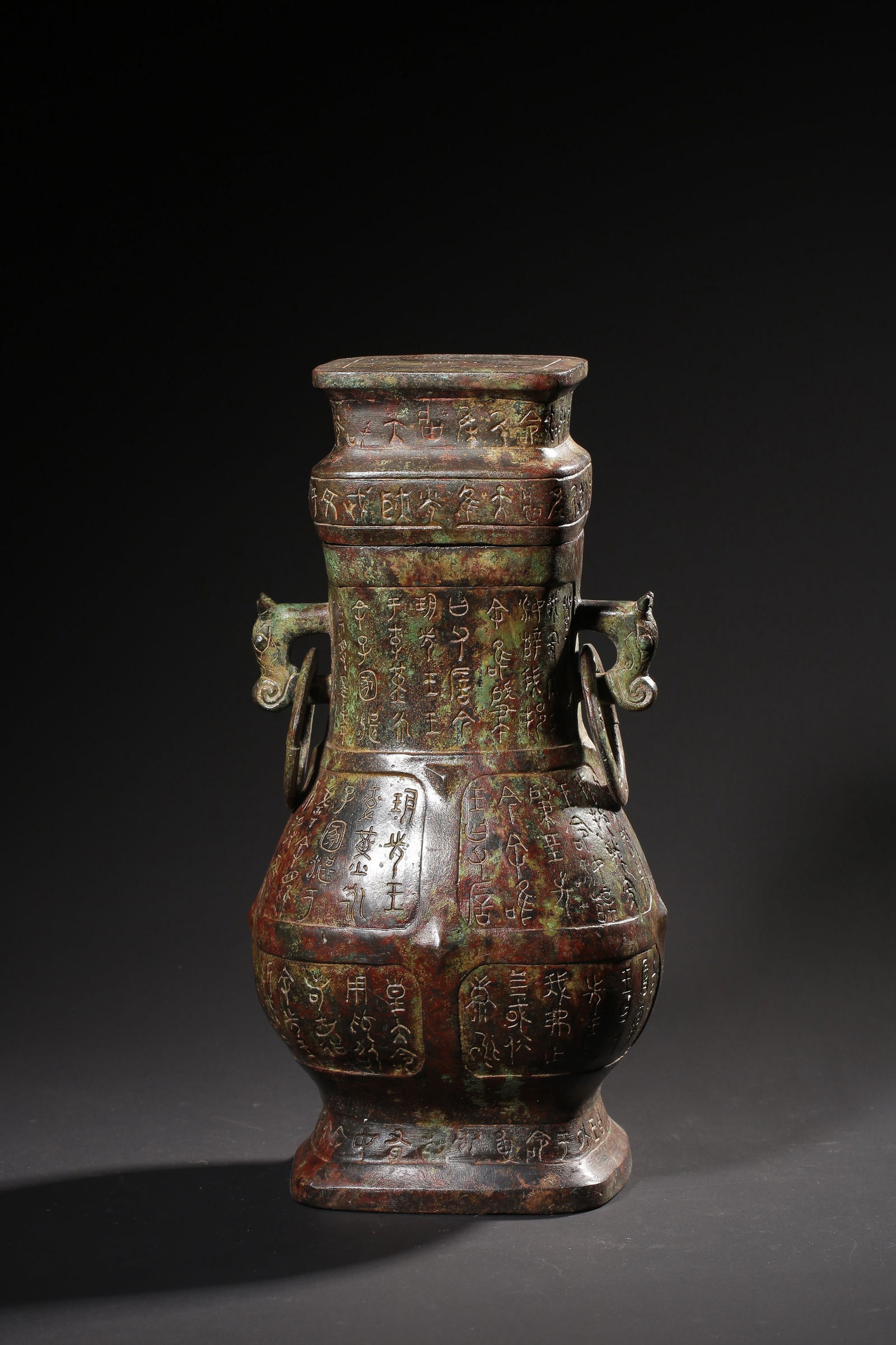 A BRONZE RITUAL WINE VESSEL,HAN DYNASTY: L:15.3cm W:14cm H:30.5cm