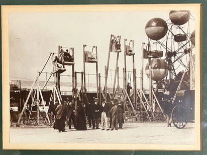 Eugene Atget photograph printed by Berenice Abbott: Eugene Atget (French, 1857-1927)/ Berenice Abbott (American, 1898-1991). "Fairground Swings, Paris", c. 1898 (printed later). Silver gelatin print. Unsigned. Printer: Berenice Abbott. Dimensions: 6 1/