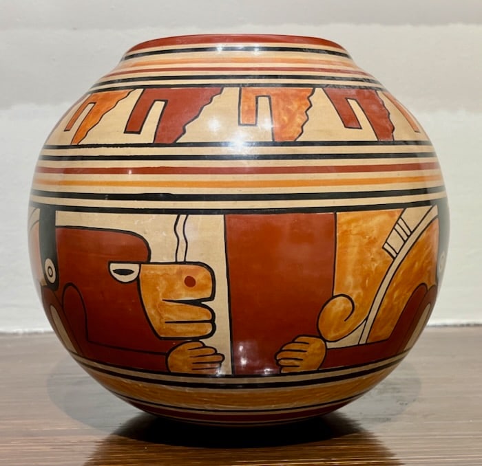 Nicaraguan Pottery: Juan Boza Gutierrez (Nicaraguan). Painted stone polished fired clay. Signed on underside and dated 2001. Dimensions: 6" (h) x 8" (w). It is most likely that the Corbridges picked up this Nicaragua Pot