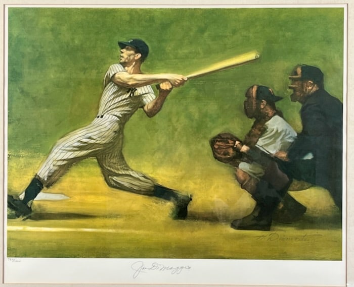 The Yankee Clipper signed lithograph: Artist: Harvey Dinnerstein. Color lithograph. Signed by DiMaggio in pencil, lower margin. Edition number: 720/1500. Dimensions: 17" x 22". Matted and framed under glass: 20 1/2" x 24 1/2". Newspaper c