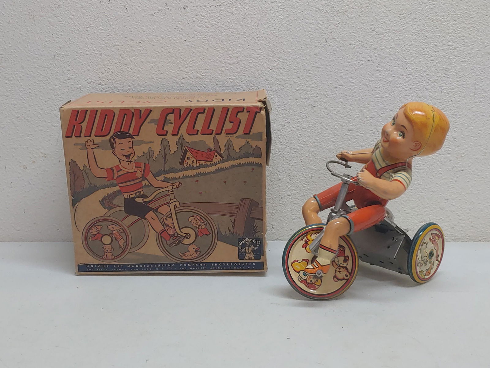 Unique Art Kiddy Cyclist Wind-Up Tin Toy (1 of 10)