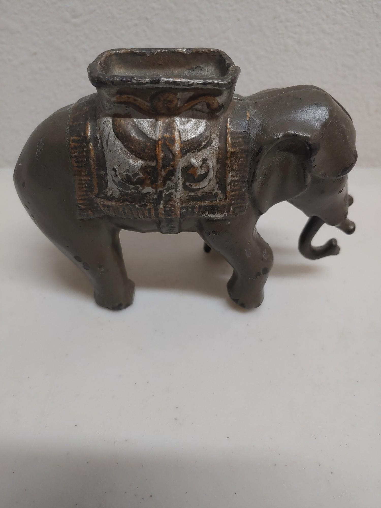 Cast Iron Elephant Bank Toy: Approximately 3.50" tall x 5" wide.