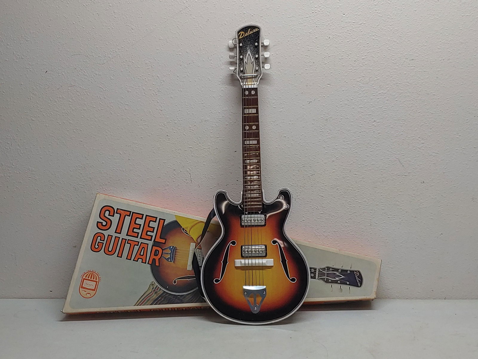 Deluxe 10 steel guitar toy with box: Approx 28 in