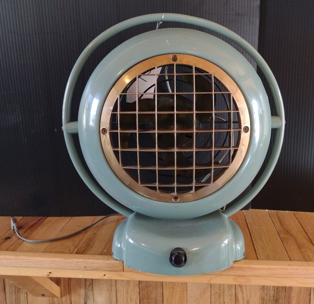 Atomic Style A.C. Gilbert Co. Fan: 14" x 16" In desirable seafoam green paint, this atomic inspired fan has loads of vintage retro style. In working order. Please see photos for condition.