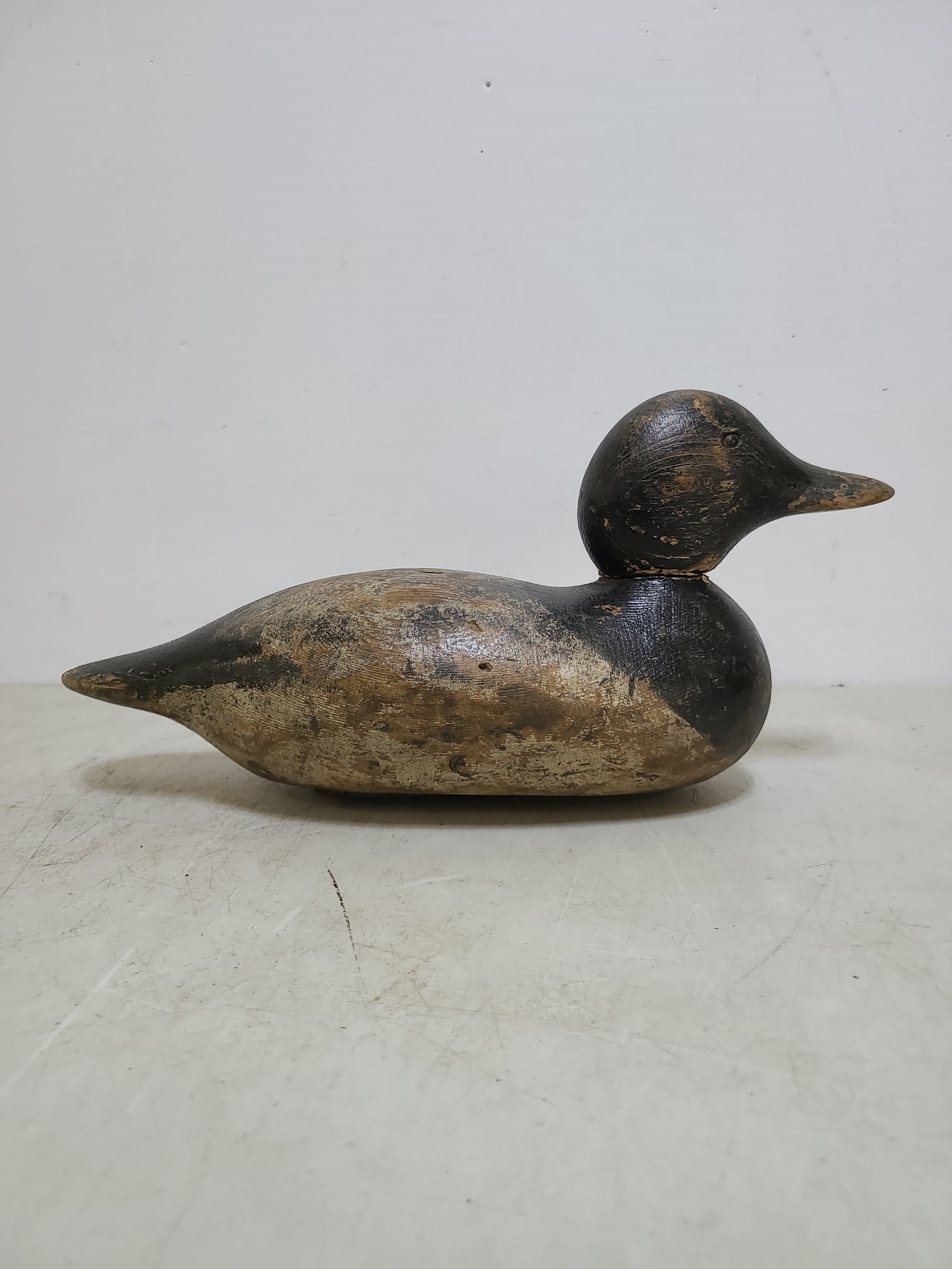 Nice wooden duck decoy.: Wooden duck decoy unverified Mesa appears to be? A nice condition tack eyes. Appears to be original paint, you decide.