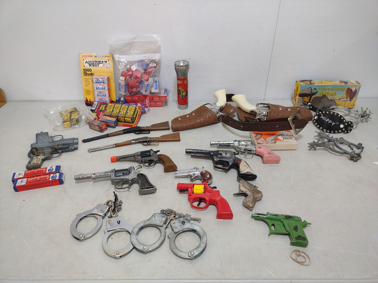 Toy Guns: Includes Cap Guns, Hand Cuffs, Spurs