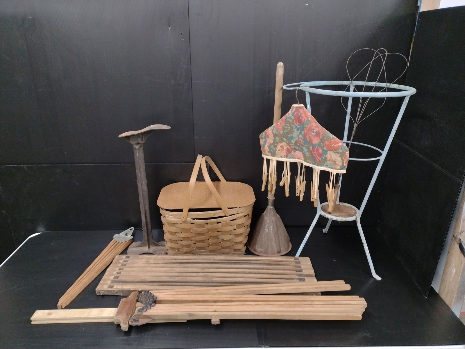 Vintage Drying Racks, Picnic Basket, Shoe Anvil And More: Vintage drying racks still very functional.Nice display pieces. Lot also includes plant stand, Vintage rug beater and more.