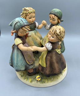 Ring Around The Rosie Hummel 4 Children: This is the Hummel Ring Around The Rosie figure. It features 4 children. Please see the images to see how it is signed. Goebel W. Germany along with the Hummel signature. It stands 7” tall. It h