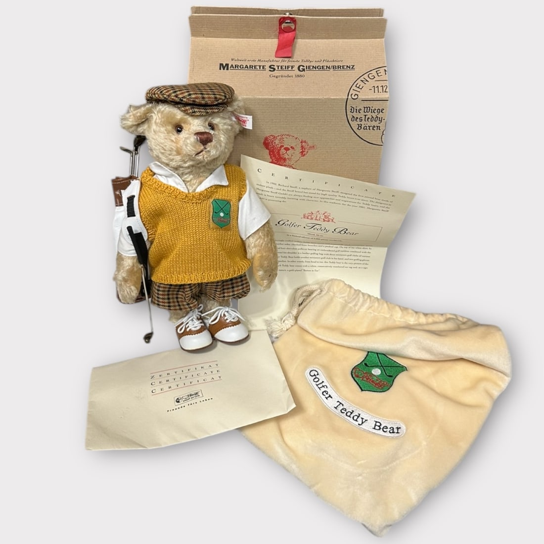 Steiff Golfer Bear L Ed With Clubs Boxed: This is the Limited Edition Golfer Bear. Golfspieler He has the white L. Ed. Ear tag. It is a L. Ed. Of only 3000 worldwide and this is number 02421 The EIN is 670671 He comes with his golf bag full o