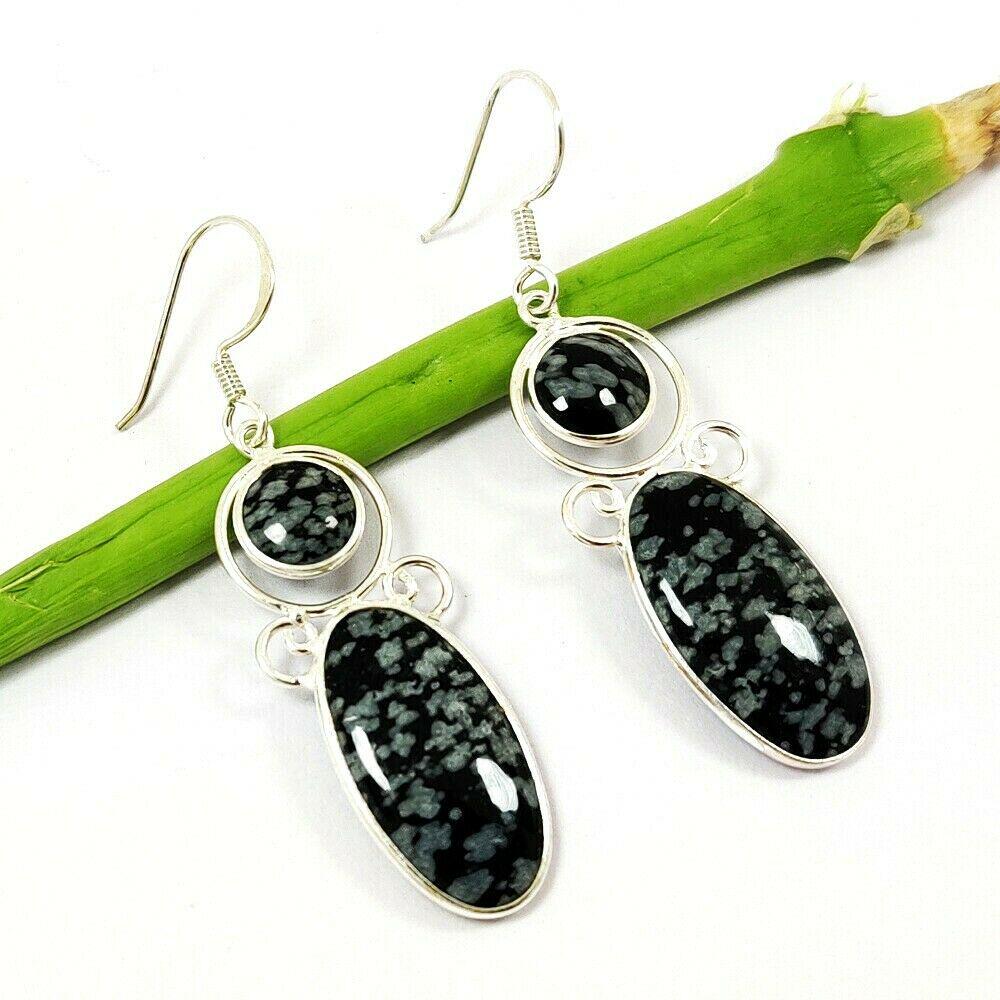 BLACK FOSSIL CORAL 92.5 STERLING SILVER EARRING: BLACK FOSSIL CORAL 92.5 STERLING SILVER EARRING Product Type : EARRING Main Stone : FOSSIL CORAL Main Stone Shape : OVAL Main Stone Color : BLACK Metal : STERLING SILVER Metal Purity : 92.5 Earring Si