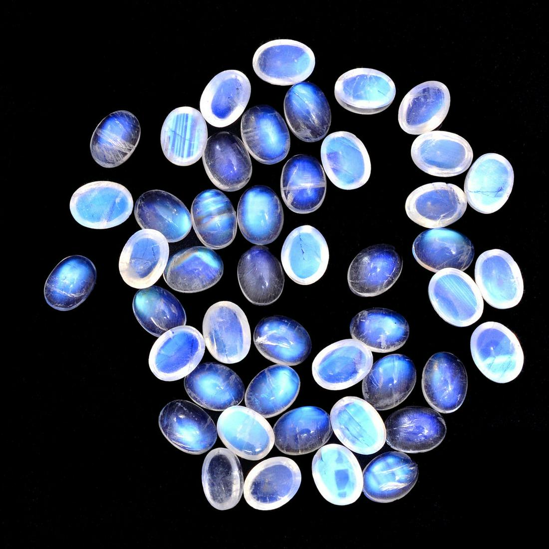 Rainbow Moonstone 6x4 MM Oval Cabochon 50 Pieces: Natural Rainbow Moonstone 6x4 MM Oval Cabochon 50 Pieces Gemstone : Rainbow Moonstone Shape : Oval Size : 6x4 MM Color : Multicolor Type : Cabochon Quantity : 50 Pieces Wei