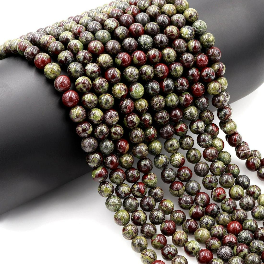 Natural Dragon Blood Jasper Gemstone 6 mm Round Smooth Plain Beads 5 Strand: Natural Dragon Blood Jasper Gemstone 6 mm Micro Round Smooth Plain Beads Rondelle 5 Strand 15.5 Inches Each Product Type : Loose Beads Strand Gemstone : Dragon Blood Jasper Beads Shape : Round Smooth