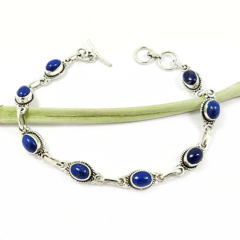 LAPIS LAZULI 92.5 STERLING SILVER BRACELET: LAPIS LAZULI 92.5 STERLING SILVER BRACELET Product Type : BRACELET Main Stone : LAPIS LAZULI Main Stone Shape : OVAL Main Stone Size : 7X5 MM Main Stone Color : BLUE Metal : STERLING SILVER Metal Puri