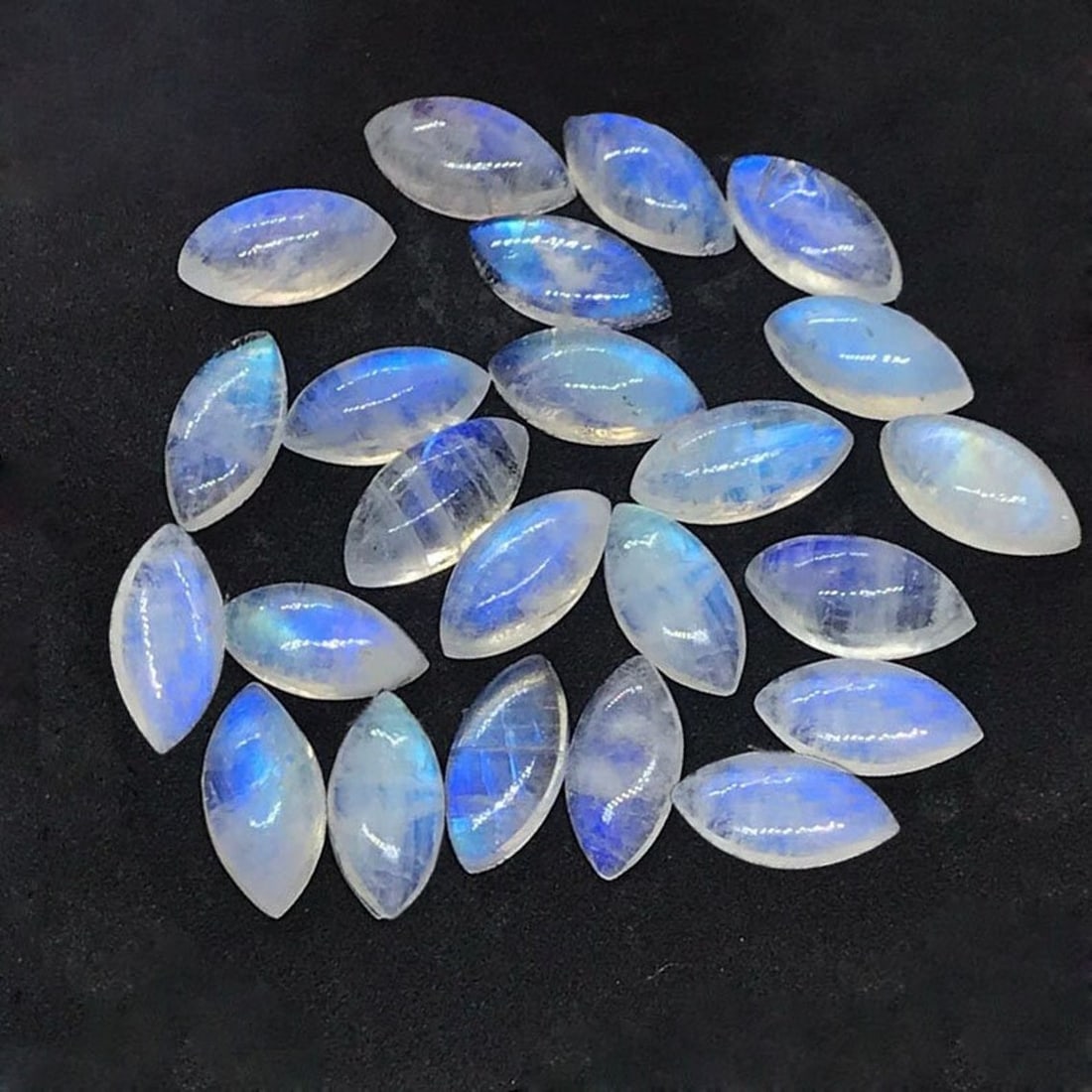 Rainbow Moonstone 5x10 MM Marquise Cabochon 25 Pieces: Natural Rainbow Moonstone 5x10 MM Marquise Cabochon 25 Pieces Gemstone : Rainbow Moonstone Shape : Marquise Size : 5x10 MM Color : Multicolor Type : Cabochon Quantity : 25 Pieces