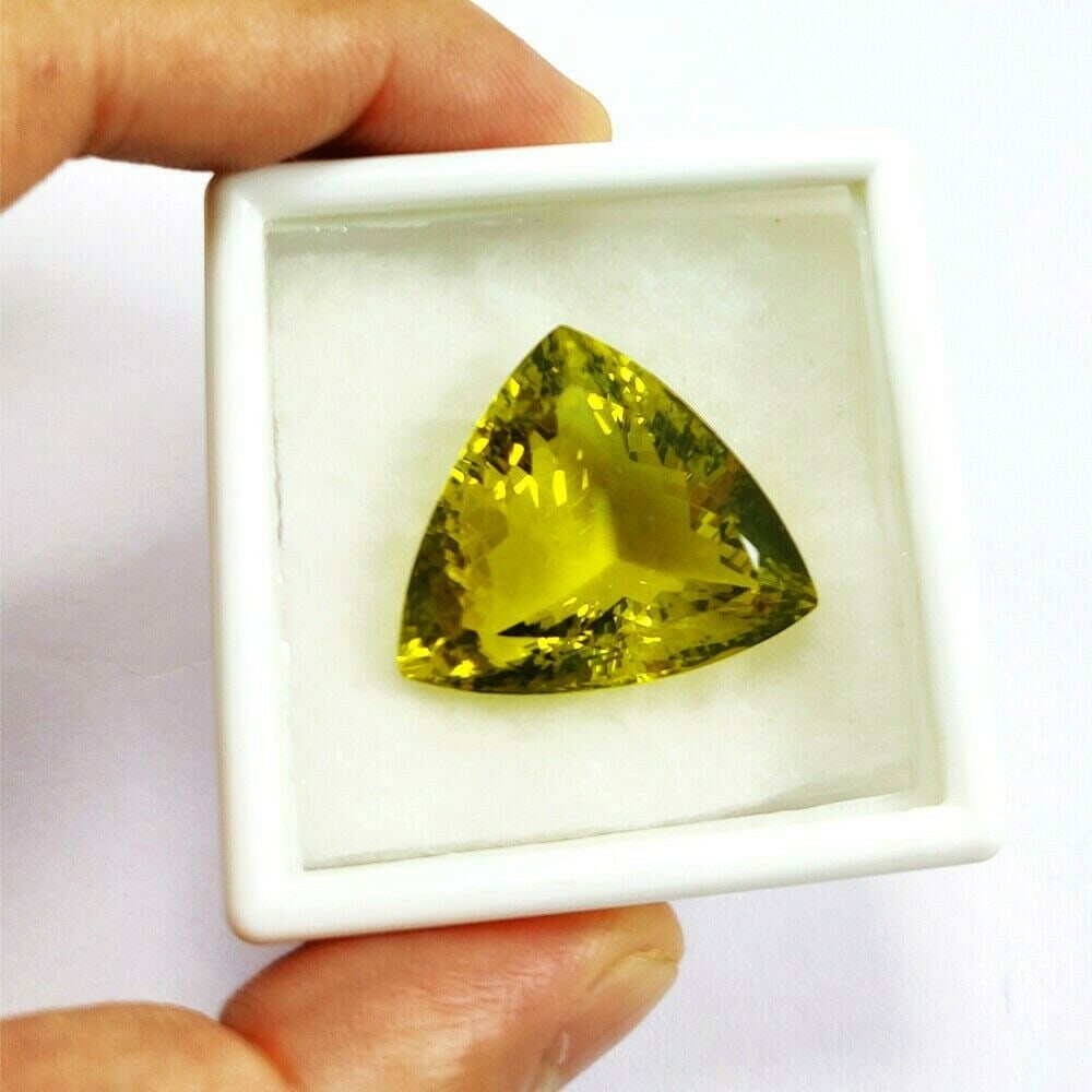 Natural Lemon Quartz Trillion Faceted Cut 45.2 Carats Gemstone: Natural Lemon Quartz Trillion Faceted Cut 45.2 Carats Gemstone Gemstone : Lemon Quartz Stone Shape : Trillion Stone Cutting Type : Faceted Cut Stone Weight : 45.2 Carats Stone Measurement : </