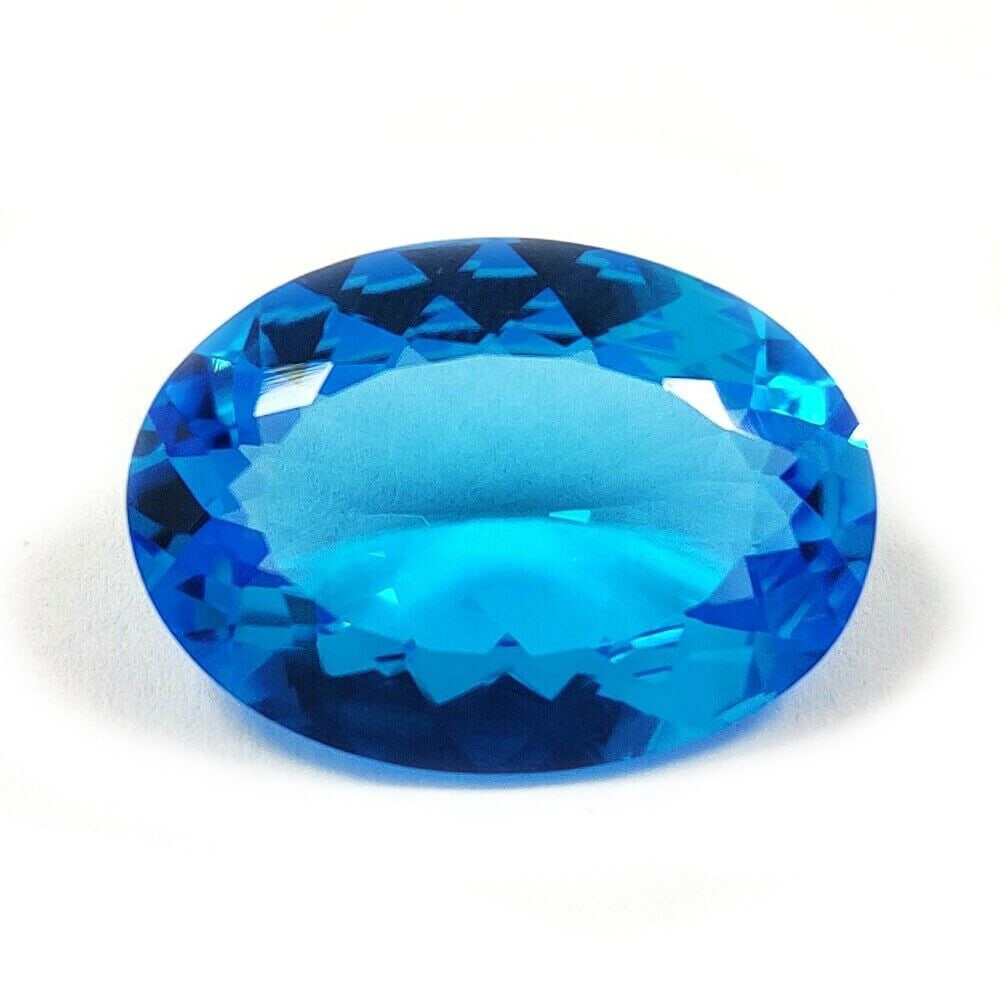 Natural Swiss Blue Topaz Oval Faceted Cut 31.09 Carats Gemstone: Natural Swiss Blue Topaz Oval Faceted Cut 31.09 Carats Gemstone Gemstone : Swiss Blue Topaz Stone Shape : Oval Stone Cutting Type : Faceted Cut Stone Weight : 31.09 Carats Stone Measurement :
