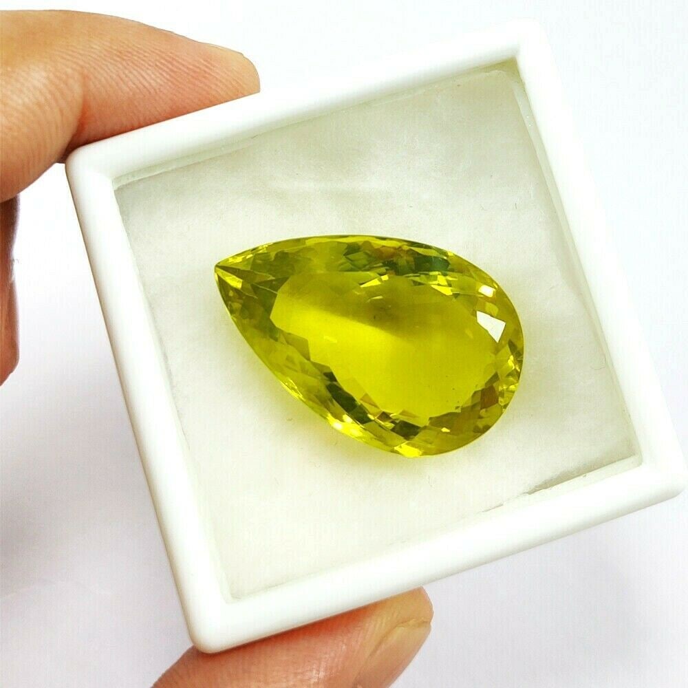 Natural Lemon Quartz Pear Faceted Cut 45.3 Carats Gemstone: Natural Lemon Quartz Pear Faceted Cut 45.3 Carats Gemstone Gemstone : Lemon Quartz Stone Shape : Pear Stone Cutting Type : Faceted Cut Stone Weight : 45.3 Carats Stone Measurement : 32x20x