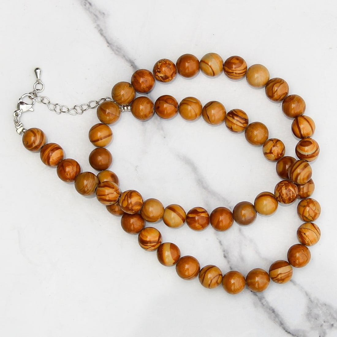 Natural Camel Skin Jasper 8 MM Round Smooth Beads Necklace: Natural Camel Skin Jasper 8 MM Round Smooth Beads Necklace Gemstone : Camel Skin Jasper Shape : Round Beads Beads Size : 8 MM Beads Type : Smooth Necklace Length : 17.5 Inches + 2.5 Inches Adjustab
