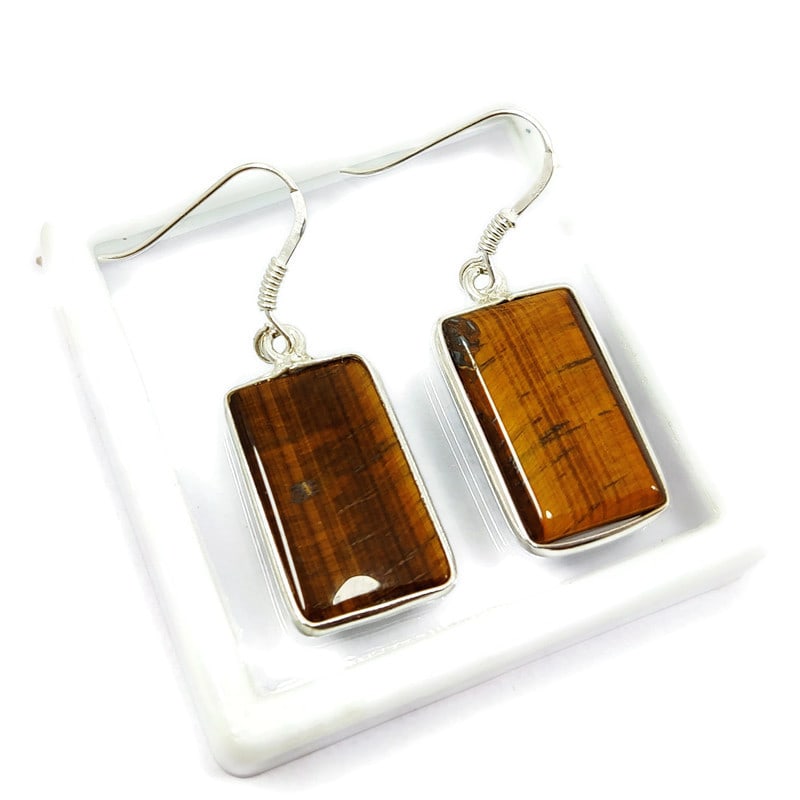 TIGER'S EYE 92.5 STERLING SILVER EARRING: TIGER'S EYE 92.5 STERLING SILVER EARRING Product Type : EARRING Main Stone : TIGER'S EYE Main Stone Shape : OCTAGON Main Stone Size : 20X12 MM Main Stone Color : BROWN Metal : STERLING SILVER Metal Pu