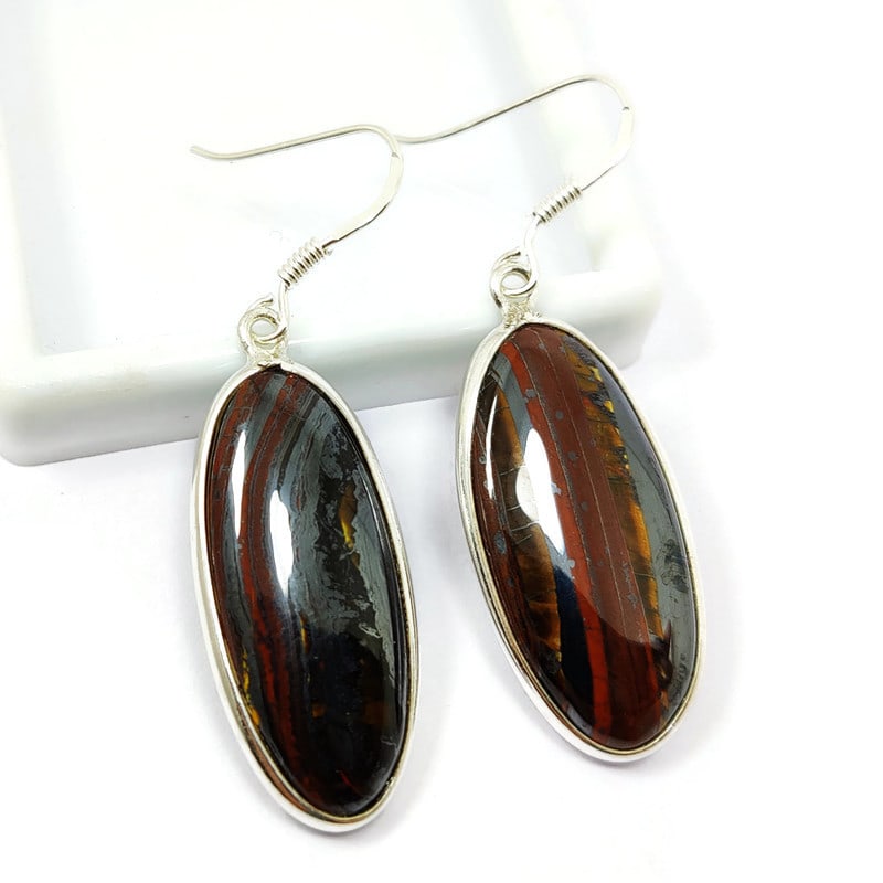 IRON TIGER 92.5 STERLING SILVER EARRING: IRON TIGER 92.5 STERLING SILVER EARRING Product Type : EARRING Main Stone : IRON TIGER Main Stone Shape : OVAL Main Stone Size : 30X12 MM Main Stone Color : MULTICOLOR Metal : STERLING SILVER Metal Pu