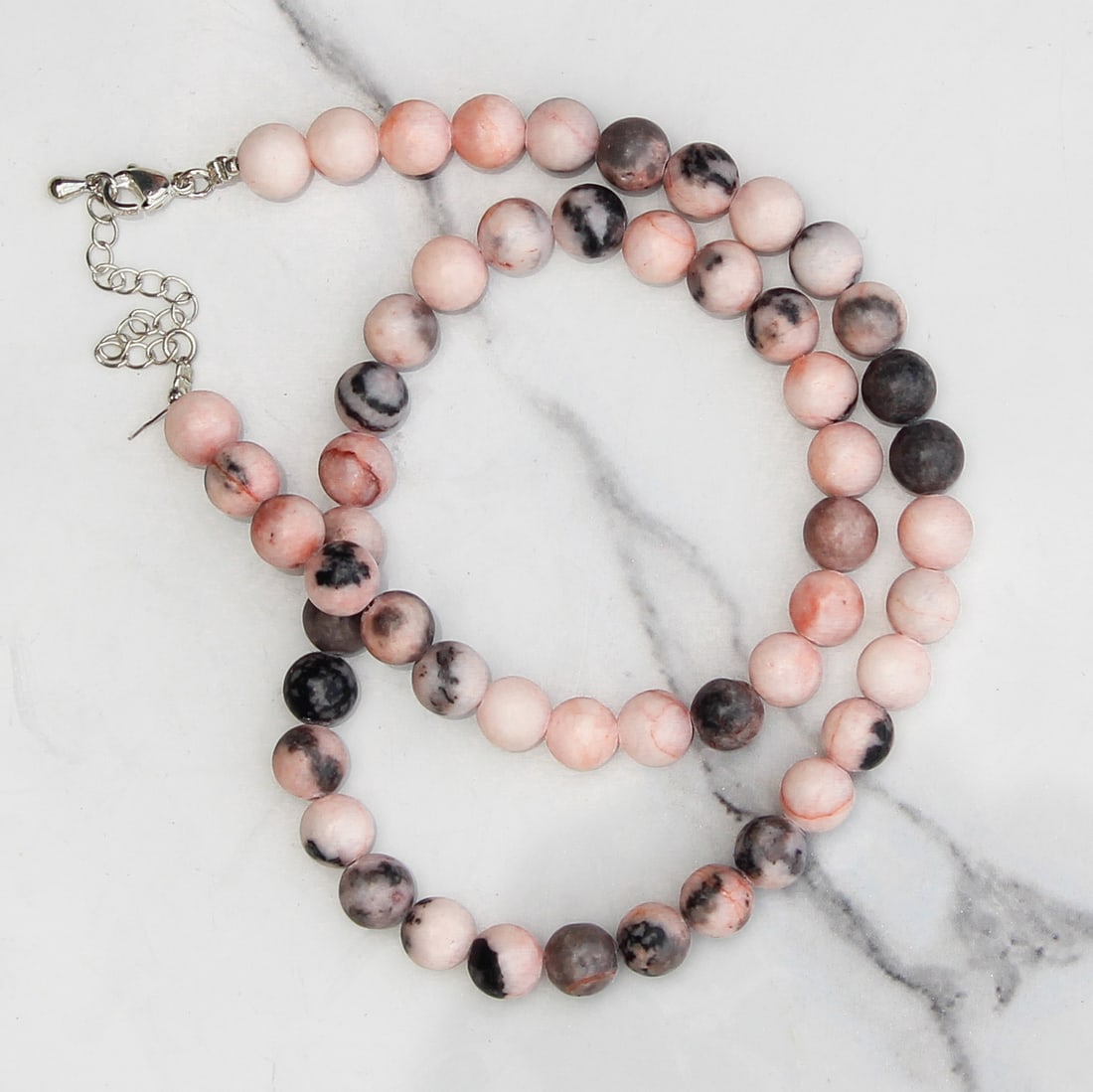 Natural Pink Zebra Jasper 8 MM Round Smooth Beads Necklace: Natural Pink Zebra Jasper 8 MM Round Smooth Beads Necklace Gemstone : Pink Zebra Jasper Shape : Round Beads Beads Size : 8 MM Beads Type : Smooth Necklace Length : 17.5 Inches + 2.5 Inches Adjustab