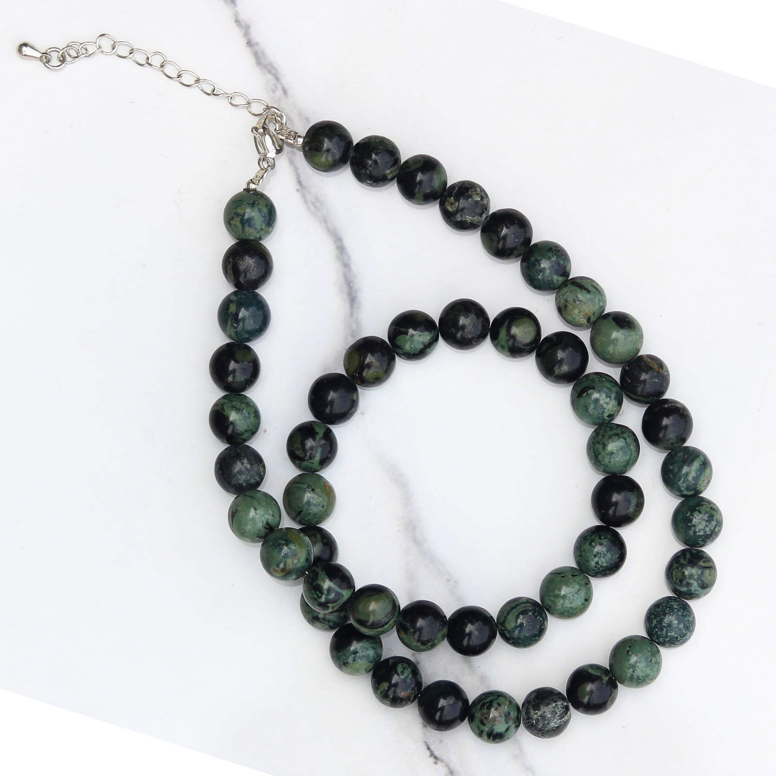 Natural Green Sparrow Jasper 8 MM Round Smooth Beads Necklace: Natural Green Sparrow Jasper 8 MM Round Smooth Beads Necklace Gemstone : Green Sparrow Jasper Shape : Round Beads Beads Size : 8 MM Beads Type : Smooth Necklace Length : 17.5 Inches + 2.5 Inches Ad