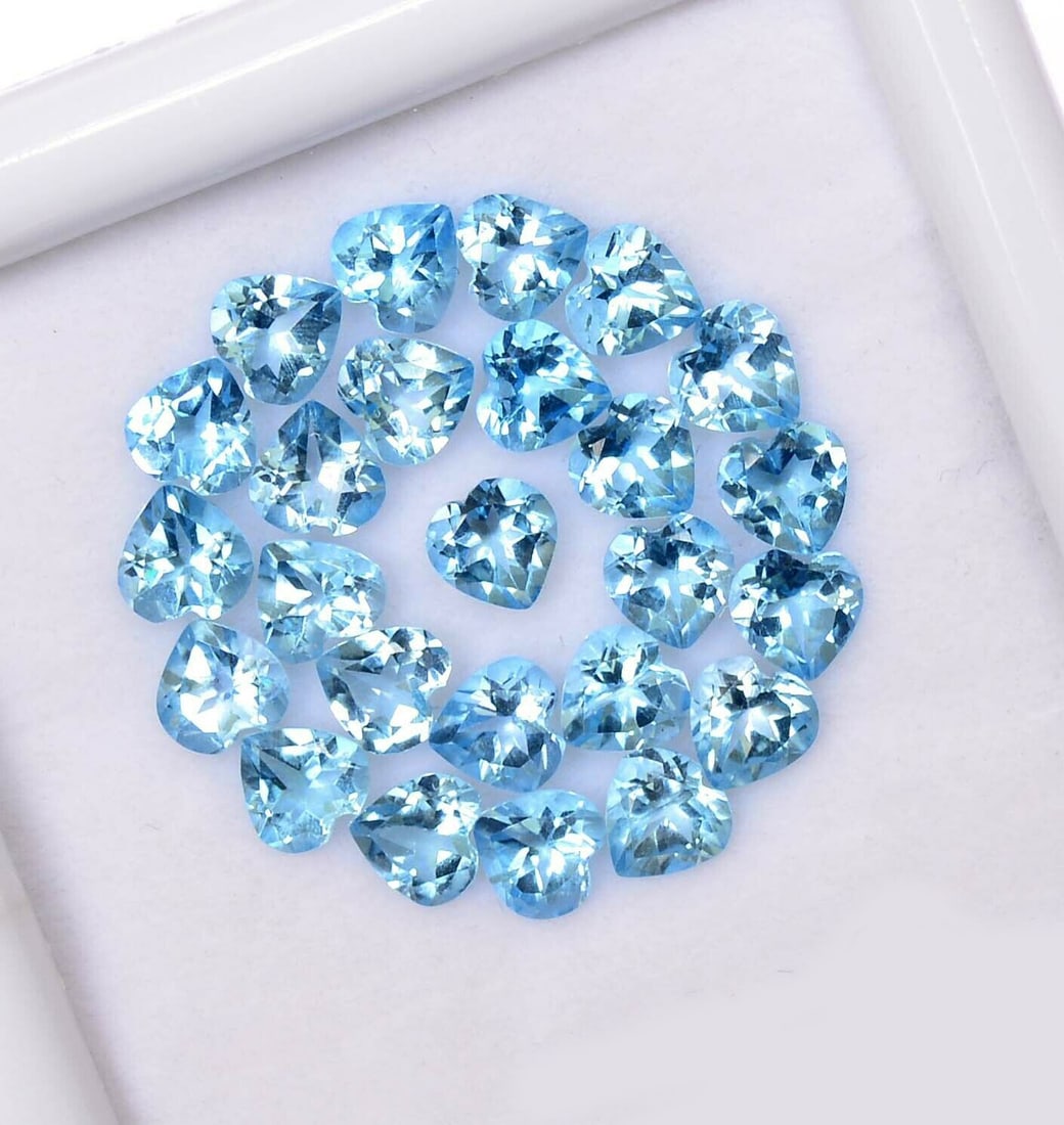 Blue Topaz 5x5 MM Heart Faceted Cut 50 Pieces: Natural Blue Topaz 5x5 MM Heart Faceted Cut 50 Pieces Gemstone : Blue Topaz Shape : Heart Size : 5x5 MM Color : Sky Blue Type : Faceted Cut Quantity : 50 Pieces Weight : </