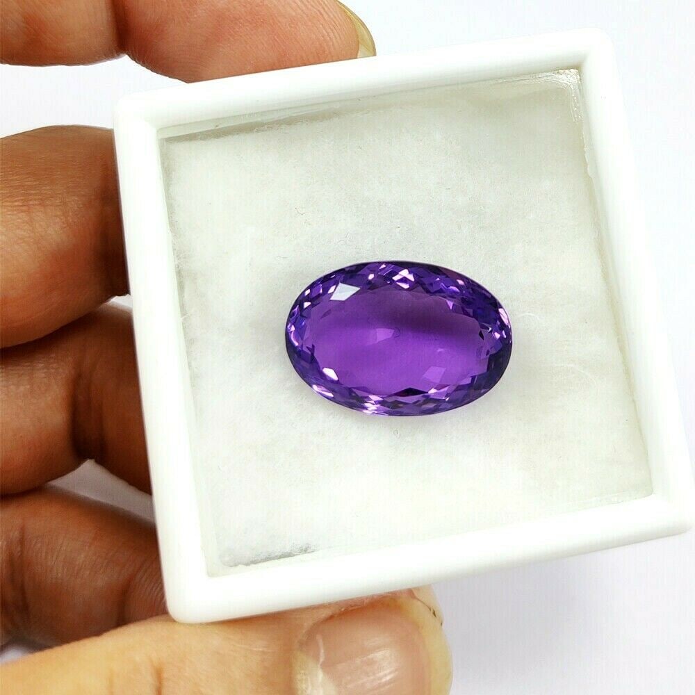 Natural Amethyst Oval Faceted Cut 22.65 Carats Gemstone: Natural Amethyst Oval Faceted Cut 22.65 Carats Gemstone Gemstone : Amethyst Stone Shape : Oval Stone Cutting Type : Faceted Cut Stone Weight : 22.65 Carats Stone Measurement : 22x15x10 MM<