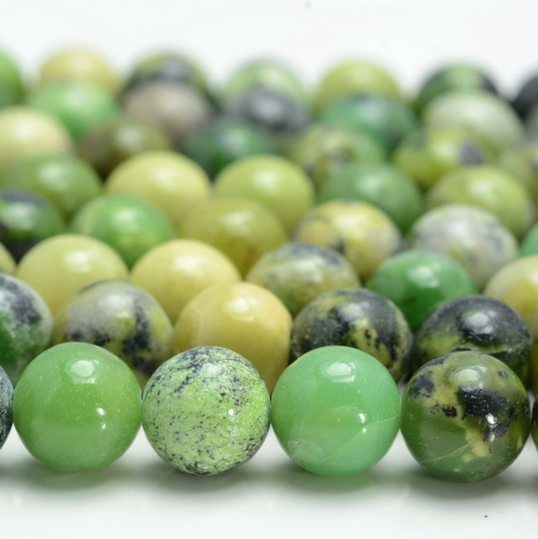 Natural Chrysoprase Gemstone 8 mm Round Smooth Beads 10 Strand: Natural Chrysoprase Gemstone 8 mm Round Smooth Beads 10 Strand 15.5 Inches Each Product Type : Loose Beads Strand Gemstone : Chrysoprase Beads Shape : Round Smooth Plain Beads Size : 8 mm Quan