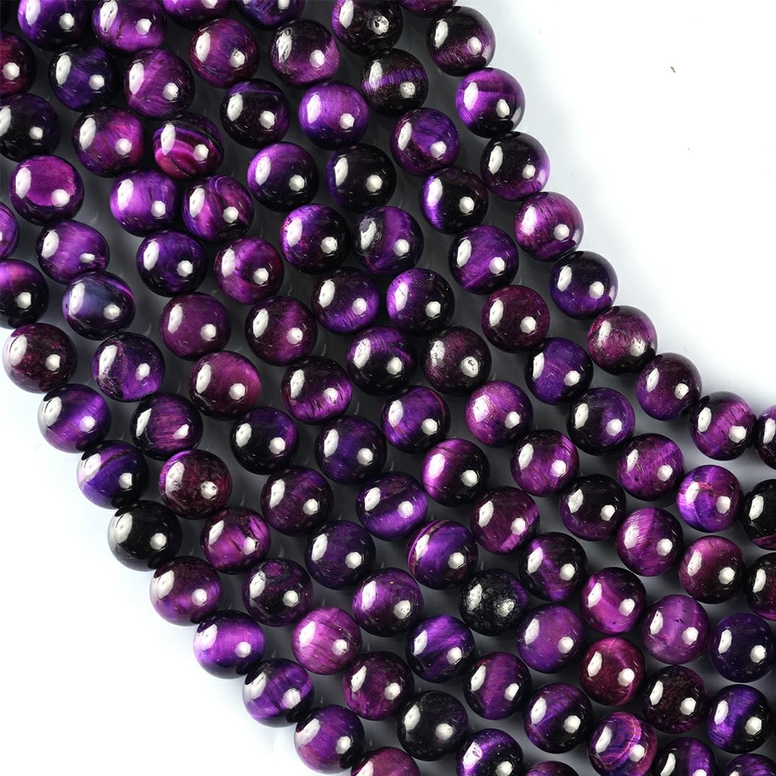 Violet Tiger's Eye Gemstone 8 MM Round Smooth Beads 10 Strand: Violet Tiger's Eye Gemstone 8 MM Round Smooth Beads 10 Strand Product Type : Loose Beads Strand Gemstone : Violet Tiger's Eye Beads Shape : Smooth Beads Size : 8 MM Quantity : 10 Lines Str