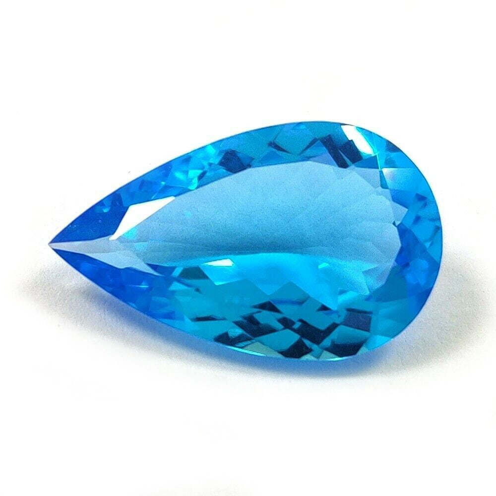 Natural Swiss Blue Topaz Pear Faceted Cut 19.35 Carats Gemstone: Natural Swiss Blue Topaz pear Faceted Cut 19.35 Carats Gemstone Gemstone : Swiss Blue Topaz Stone Shape : pear Stone Cutting Type : Faceted Cut Stone Weight : 19.35 Carats Stone Measurement :