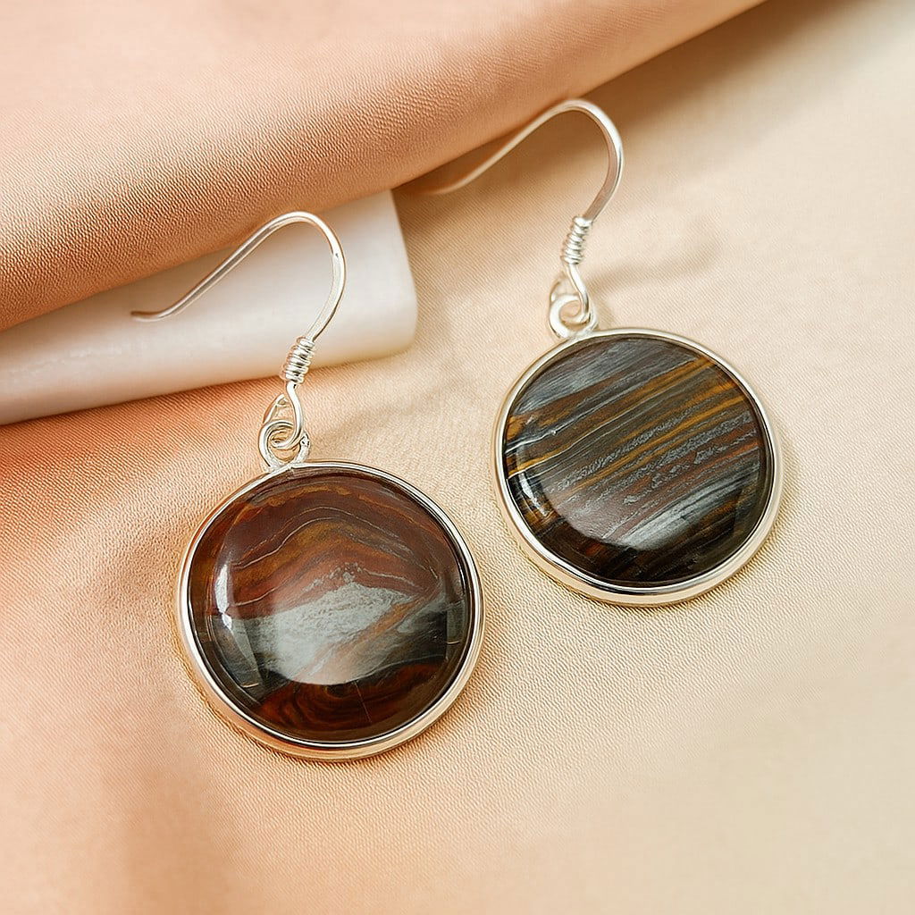 IRON TIGER 92.5 STERLING SILVER EARRING: IRON TIGER 92.5 STERLING SILVER EARRING Product Type : EARRING Main Stone : IRON TIGER Main Stone Shape : ROUND Main Stone Size : 19X19 MM Main Stone Color : MULTICOLOR Metal : STERLING SILVER Metal P