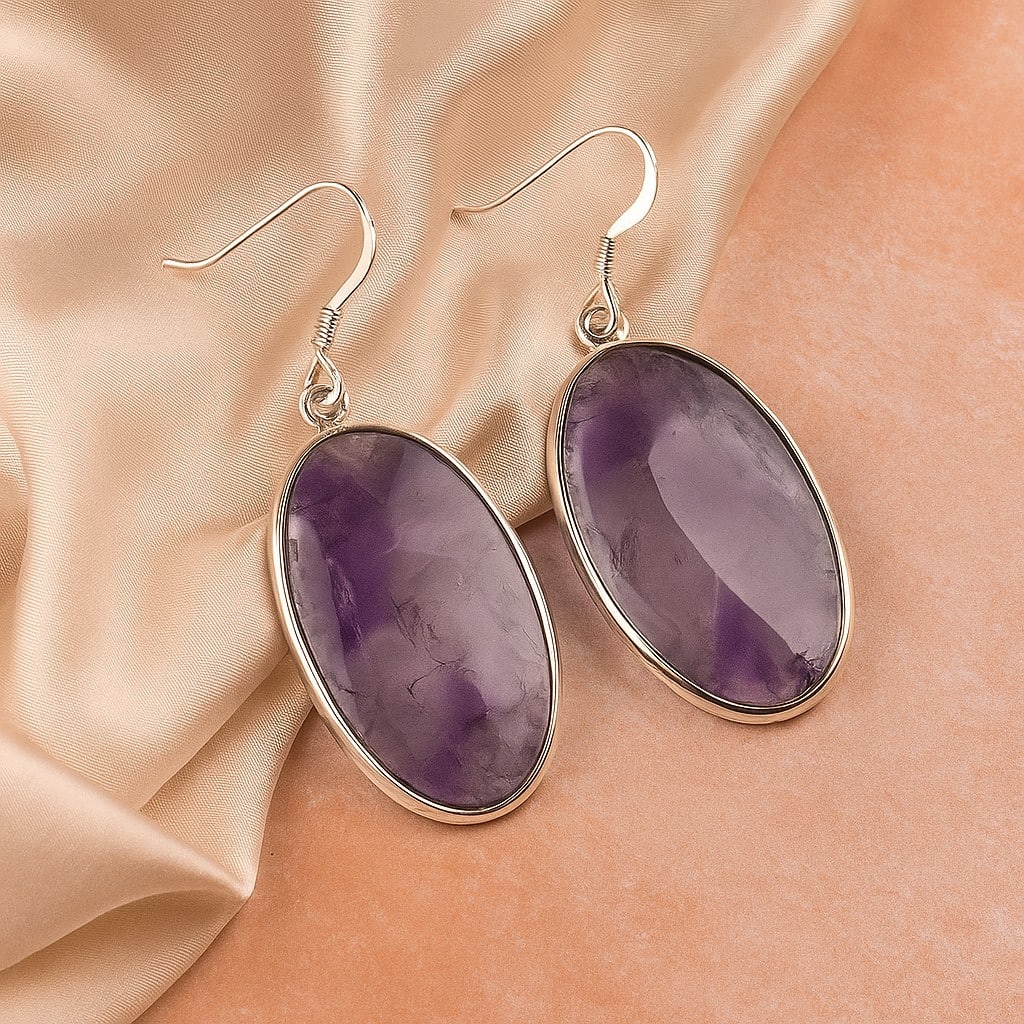 STAR AMETHYST 92.5 STERLING SILVER EARRING: STAR AMETHYST 92.5 STERLING SILVER EARRING Product Type : EARRING Main Stone : STAR AMETHYST Main Stone Shape : OVAL Main Stone Size : 29X18 MM Main Stone Color : PURPLE Metal : STERLING SILVER Metal