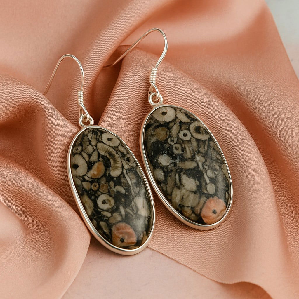 CRINOID FOSSIL 92.5 STERLING SILVER EARRING: CRINOID FOSSIL 92.5 STERLING SILVER EARRING Product Type : EARRING Main Stone : CRINOID FOSSIL Main Stone Shape : OVAL Main Stone Size : 31X17 MM Main Stone Color : MULTICOLOR Metal : STERLING SILVER