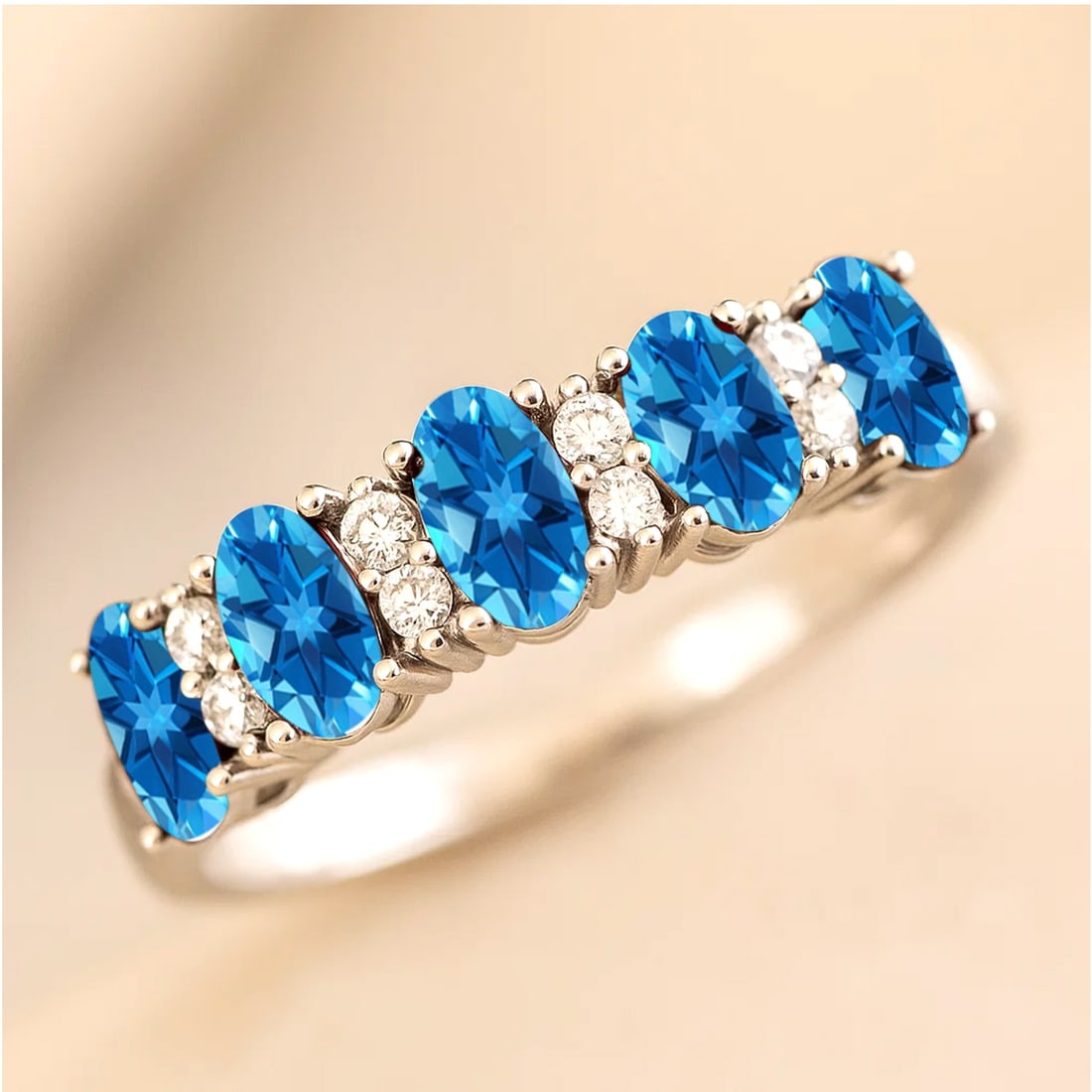 Natural Swiss Blue Topaz Gemstone & Lab Grown Diamonds Silver Ring: Natural Swiss Blue Topaz Gemstone & Lab Grown Diamonds Silver Ring Jewelry Type : Ring Gemstone : Natural Swiss Blue Topaz Gemstone Shape : Oval Gemstone Size : 5x3 MM Gemstone Quantity : 5 Pieces<