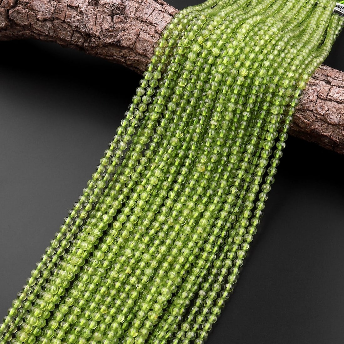 Natural Peridot Gemstone 3 MM Round Smooth Beads 10 Strand: Natural Peridot Gemstone 3 MM Round Smooth Beads 10 Strand Product Type : Loose Beads Strand Gemstone : Peridot Beads Shape : Smooth Plain Beads Size : 3 mm Quantity : 10 Lines Strand <