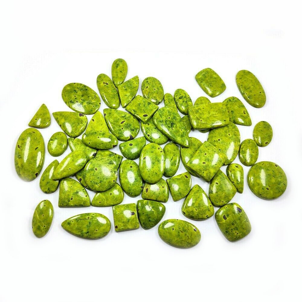 Natural Green Atlantisite Gemstone Mix Shape 1000 Cts.: GEMSTONE - ATLANTISITE SHAPE - MIX SIZE - MIX WEIGHT - 1000.00 Cts. COLOR - GREEN NATURAL/LAB CREATED - NATURAL TREATMENT - NONE COUNTRY OF ORIGIN - TASMANIA COUNTRY OF MANUFACTURE - INDIA