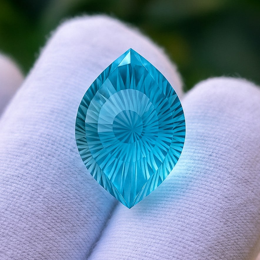 Natural Blue Topaz Eye Carved Hand Cut15.5 Cts. Gemstone: Natural Blue Topaz Eye Carved Hand Cut15.5 Cts. Gemstone Blue Topaz Shape : Eye Carved Size : 17x12.5x11 MM Color : Blue Type : Hand Cut Quantity : 1 Piece Weight : 15.5 Ca