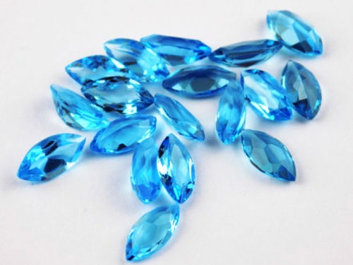 Swiss Blue Topaz 5x10 MM Marquise Faceted Cut 10 Pieces: Natural Swiss Blue Topaz 5x10 MM Marquise Faceted Cut 10 Pieces Gemstone : Swiss Blue Topaz Shape : Marquise Size : 5x10 MM Color : Sky Blue Type : Faceted Cut Quantity : 10 Piec