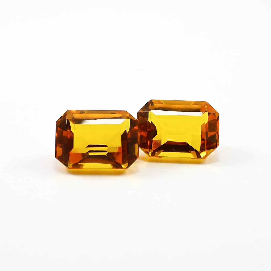 Citrine Octagon Faceted Cut 13x19 MM Gemstone Pair: Citrine Octagon Faceted Cut 13.5x19 MM Gemstone Pair Gemstone : Citrine Shape : Octagon Size : 19X13.5X10 MM Color : Golden Yellow Type : Faceted Cut Quantity : 2 Pieces Weight