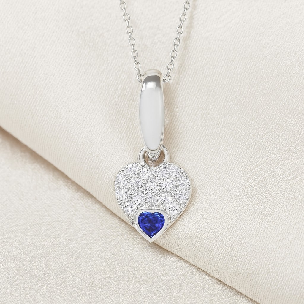 Natural Blue Sapphire & Diamond 92.5 Sterling Silver Pendant with Chain: Natural Blue Sapphire & Diamond 92.5 Sterling Silver Pendant with Chain Gemstone Shape : Heart Gemstone Size : 3 MM Gemstone Quantity : 1 Piece Diamond Type : Lab Grown Diamond Shape : Round Di