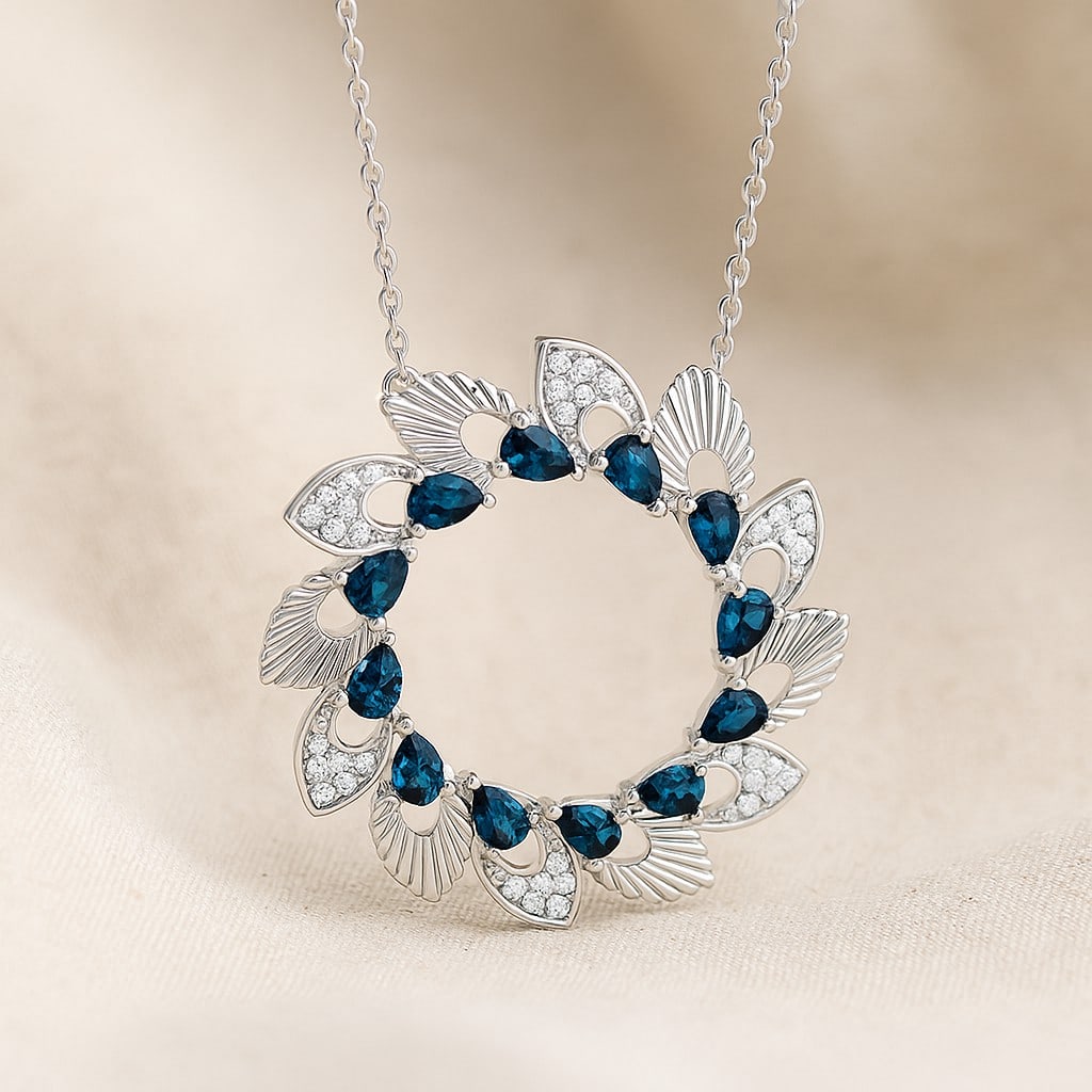 Natural London Blue Topaz & Diamond 92.5 Sterling Silver Pendant with Chain: Natural London Blue Topaz & Diamond 92.5 Sterling Silver Pendant with Chain Gemstone Shape : Pear Gemstone Size : 3x2 MM Gemstone Quantity : 12 Pieces Diamond Type : Lab Grown Diamond Shape : Round