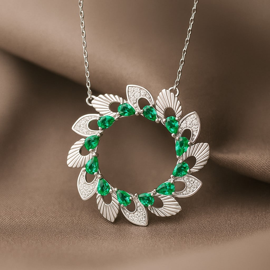 Lab Grown Emerald & Diamond 92.5 Sterling Silver Pendant with Chain: Lab Grown Emerald & Diamond 92.5 Sterling Silver Pendant with Chain Gemstone Shape : Pear Gemstone Size : 3x2 MM Gemstone Quantity : 12 Pieces Diamond Type : Lab Grown Diamond Shape : Round Dia