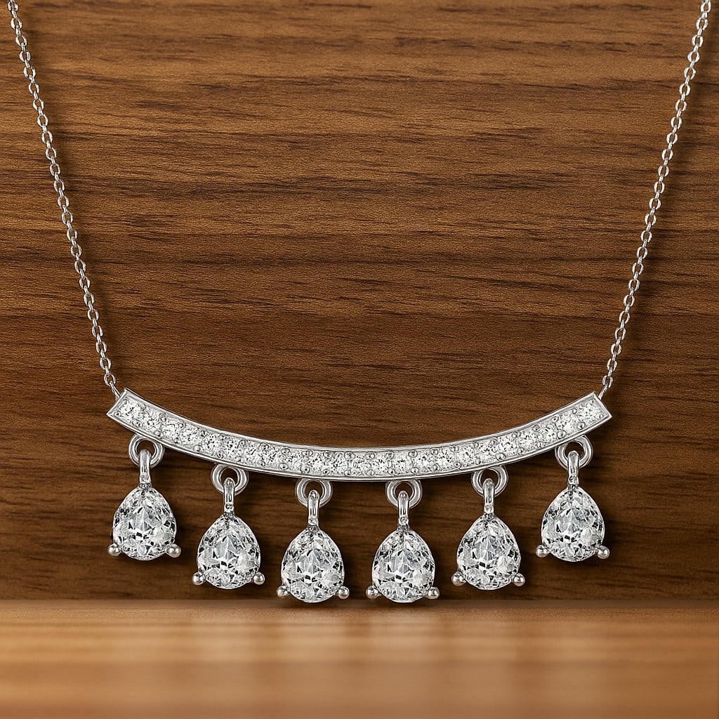 Lab Grown Diamond 92.5 Sterling Silver Necklace: Lab Grown Diamond 92.5 Sterling Silver Necklace Gemstone Shape : Pear Gemstone Size : 5x4 MM Gemstone Quantity : 6 Pieces Diamond Type : Lab Grown Diamond Shape : Round Diamond Color : D-E</