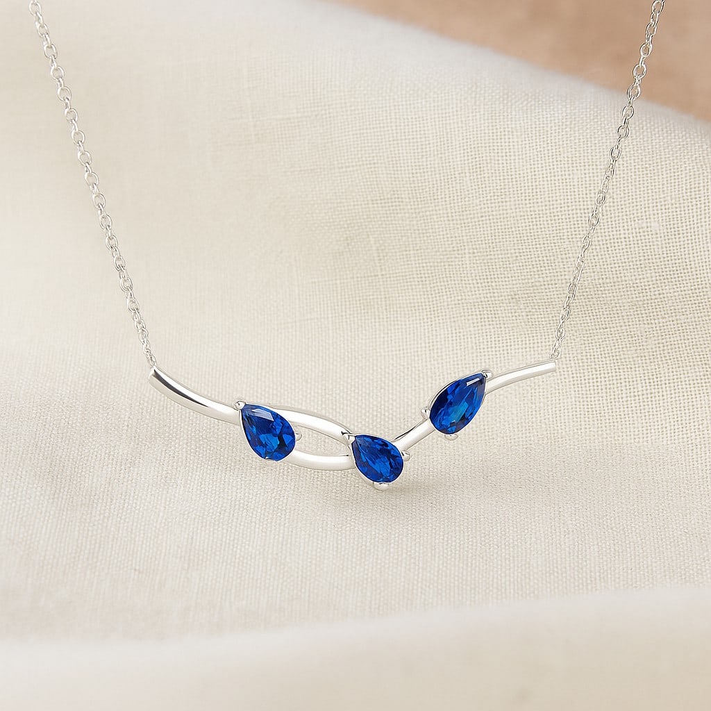 Natural Tanzanite Gemstone 92.5 Sterling Silver Necklace: Natural Tanzanite Gemstone 92.5 Sterling Silver Necklace Gemstone Shape : Pear Gemstone Size : 3 MM Gemstone Quantity : 3 Pieces Metal : Silver Metal Purity : 92.5 Sterling Silver Pendant Lengt
