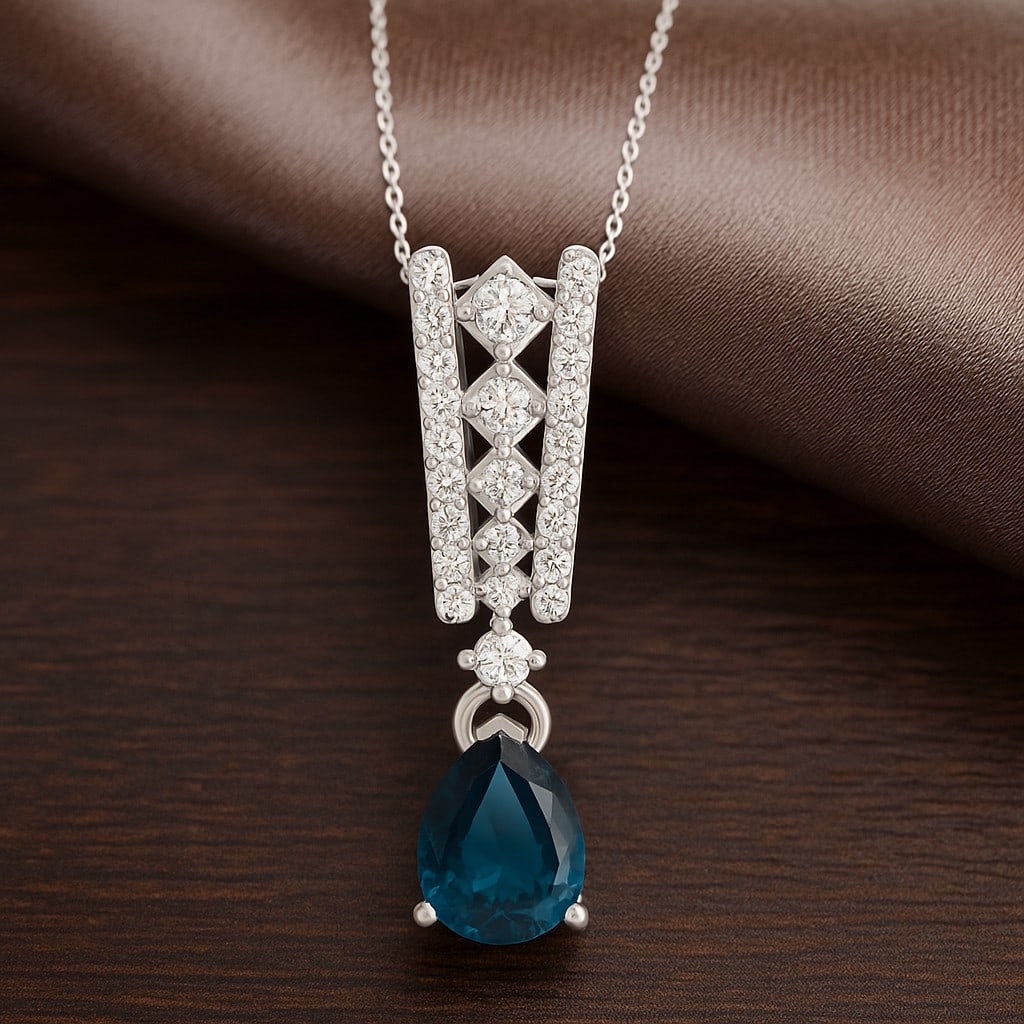 Natural London Blue Topaz & Diamond 92.5 Sterling Silver Pendant with Chain: Natural London Blue Topaz & Diamond 92.5 Sterling Silver Pendant with Chain Gemstone Shape : Pear Gemstone Size : 8x6 MM Gemstone Quantity : 1 Piece Diamond Type : Lab Grown Diamond Shape : Round<