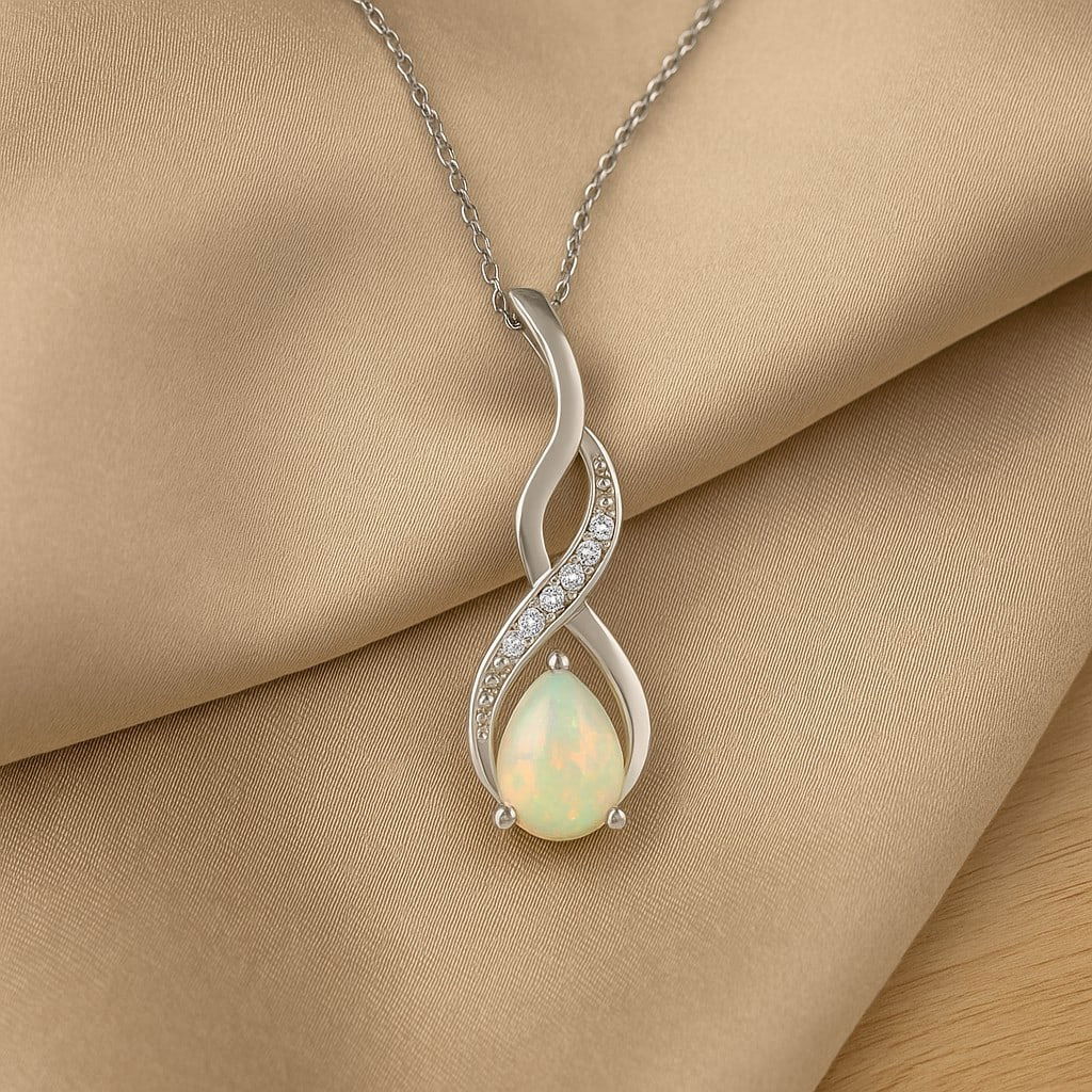 Natural Opal & Diamond 92.5 Sterling Silver Pendant with Chain: Natural Opal & Diamond 92.5 Sterling Silver Pendant with Chain Gemstone Shape : Pear Gemstone Size : 6x4 MM Gemstone Quantity : 1 Piece Diamond Type : Lab Grown Diamond Shape : Round Diamond Co