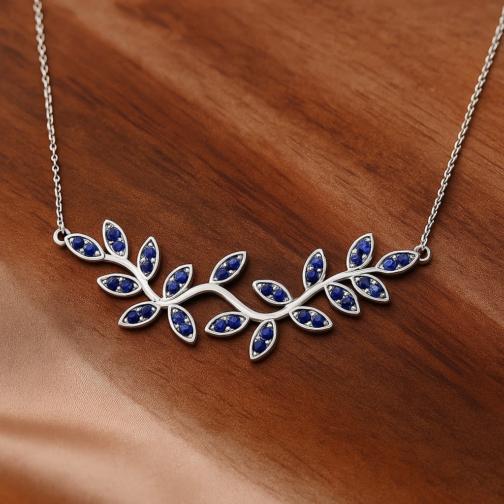 Natural Tanzanite Gemstone 92.5 Sterling Silver Necklace: Natural Tanzanite Gemstone 92.5 Sterling Silver Necklace Gemstone Shape : Round Gemstone Size : 1.4 MM Gemstone Quantity : 34 Pieces Metal : Silver Metal Purity : 92.5 Sterling Silver Pendant L